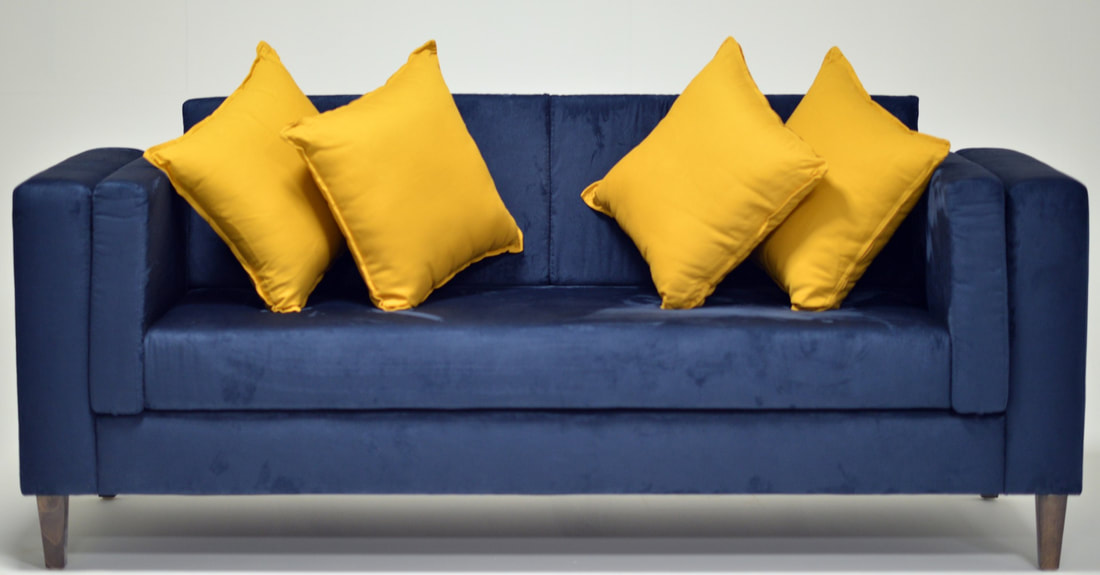 Blue sofa with yellow-mustard cushions