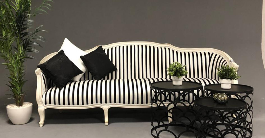 A classic 1920s sofa with a modern fabric gives new energy to old style 